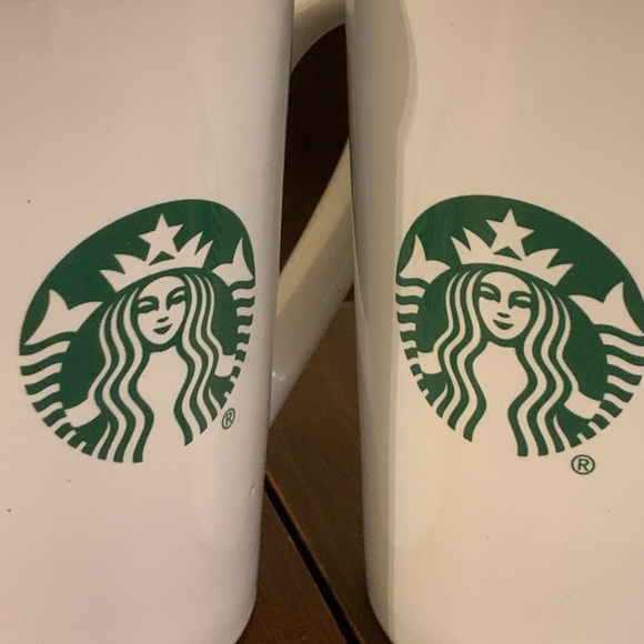 A pair of Starbucks Mermaid mugs